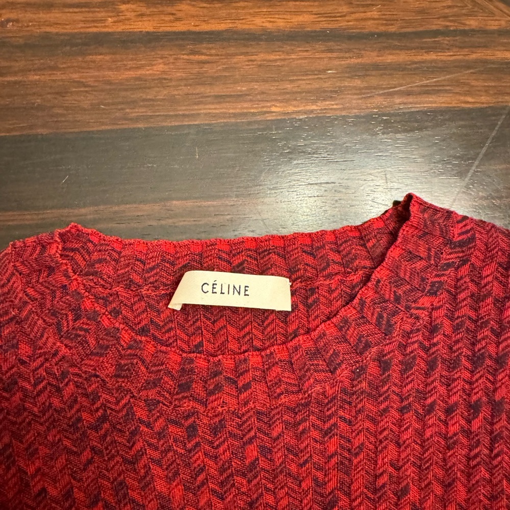 Beautiful Red Celine top with cream colored cuffs.